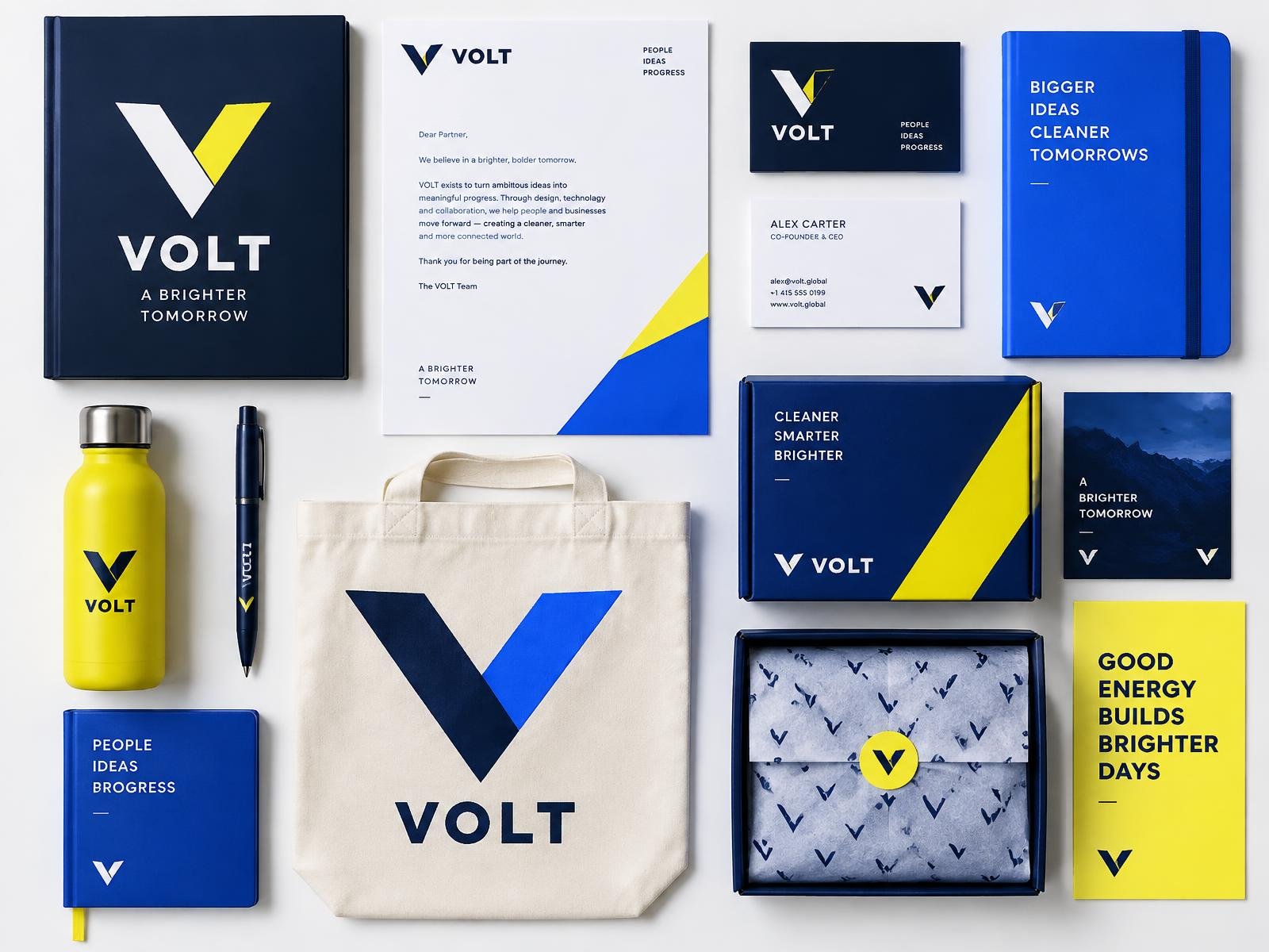 Printed brand materials including stationery and business cards on a desk
